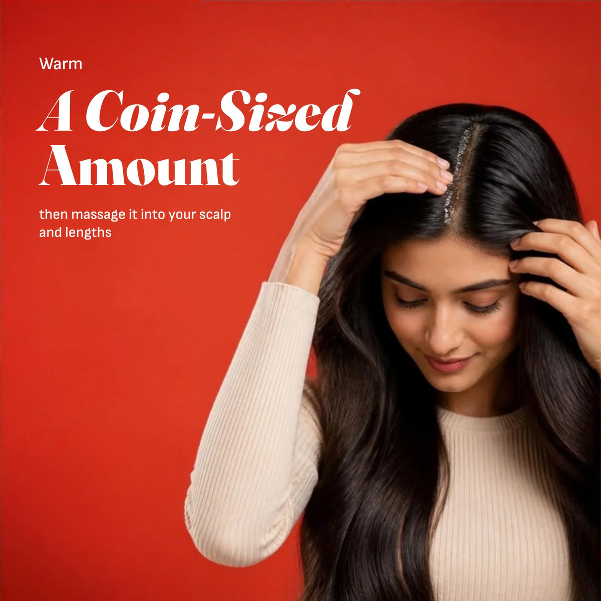 Warm a coin-sized amount, then massage it into your scalp and lengths