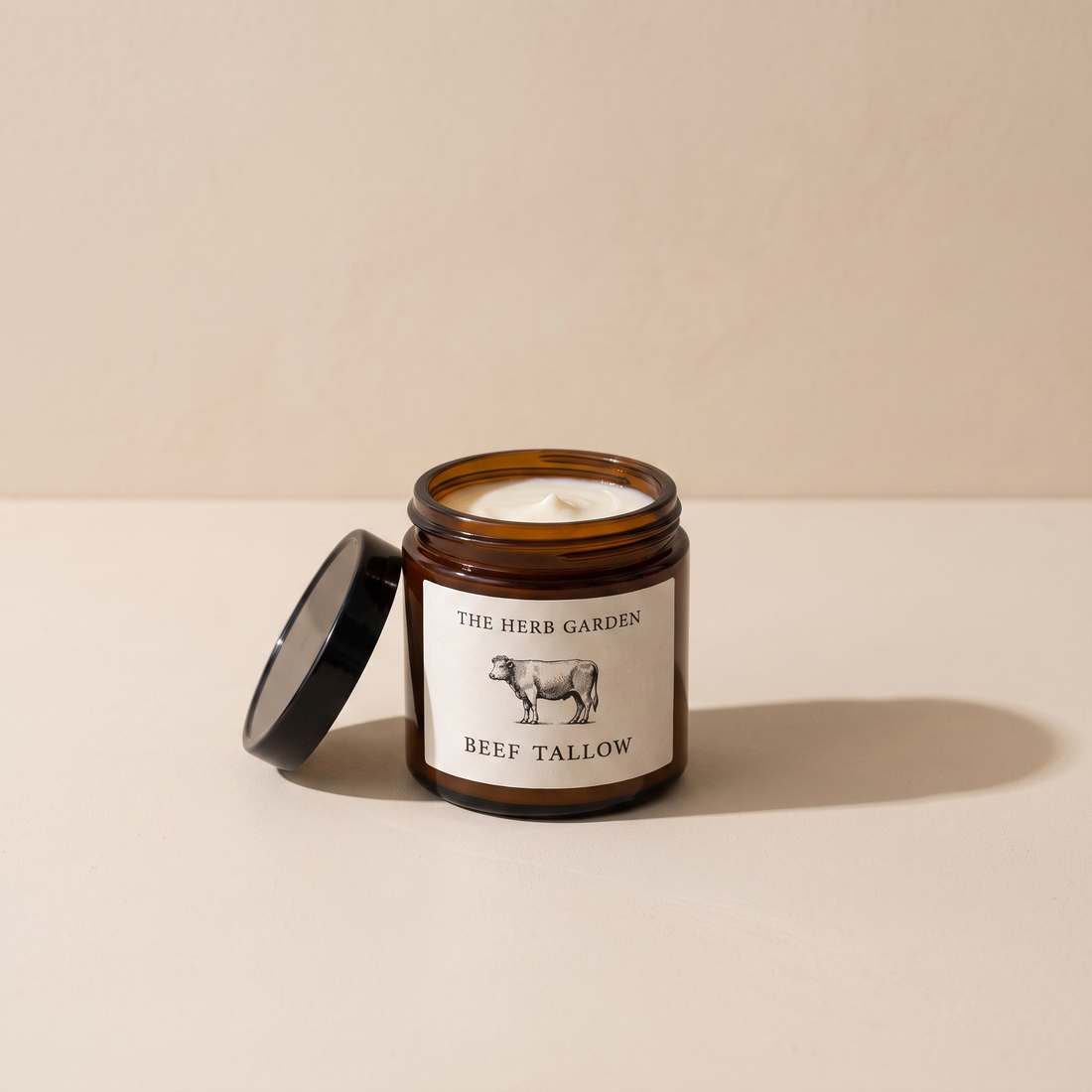 Pure Tallow Glow jar on cream