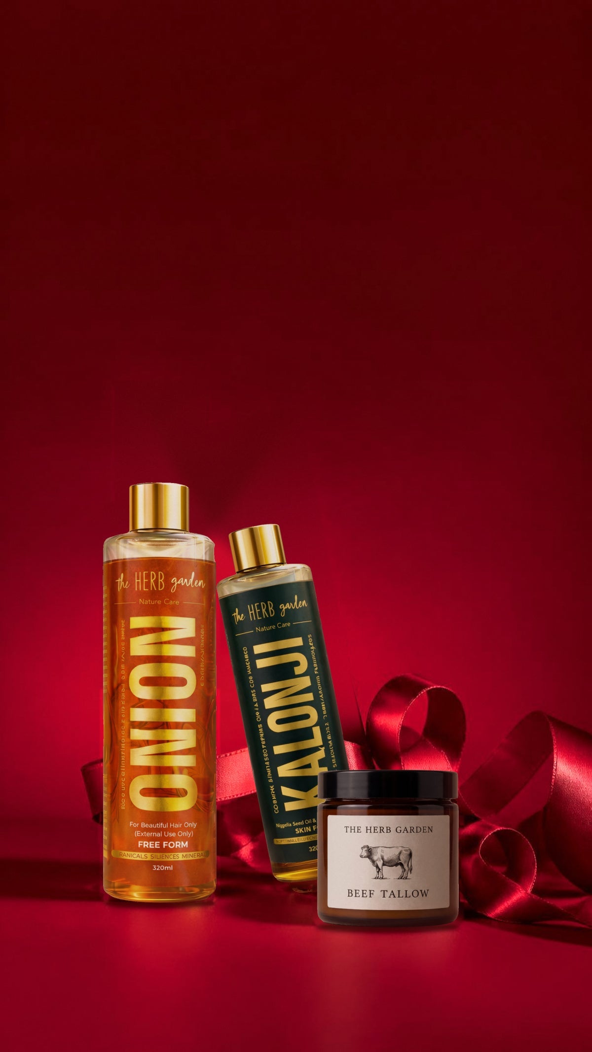 Herb Garden Onion Hair Oil, Kalonji Oil and Beef Tallow wrapped in red satin ribbon